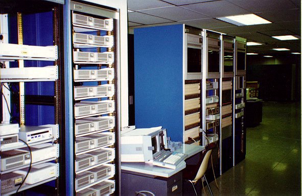 My work old place view, 1995. Left, Motorola modems for sdlc lines. Right, 4 racks with old X.25 switches, Foto by P. Nenes